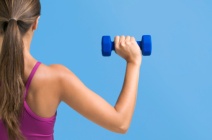 Woman-exercising-with-dumbbells